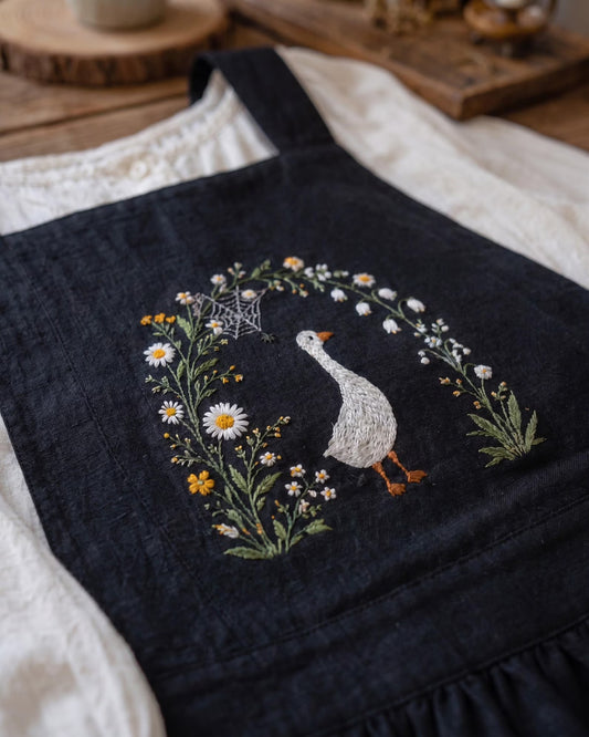 Personalized Black Linen Apron, Hand Embroidered Goose, Daisy & Lily of the Valley with Spider Web Pocket Details, Cottagecore Kitchen Apron